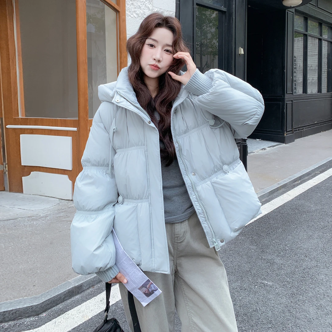 蓝色羽绒服女款2025冬季新款超好看韩版宽松连帽慵懒风加厚面包服