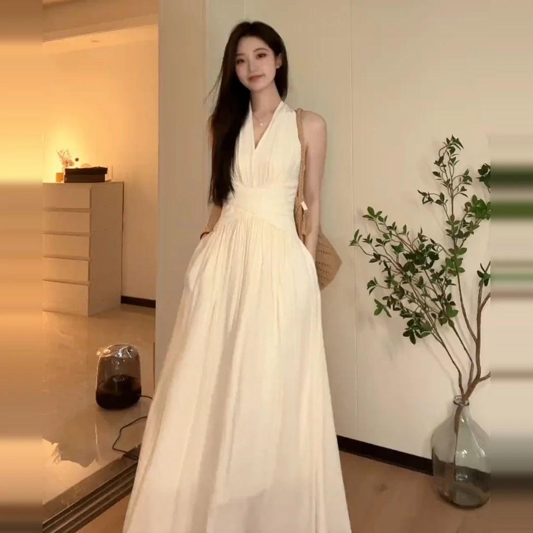 高级感法式v领挂脖连衣裙女夏季2025新款海边度假风收腰气质长裙