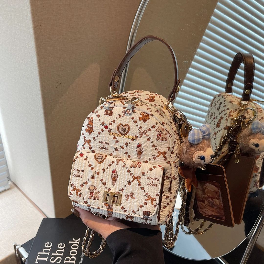 艾米兔女包2025新款简约休闲潮流可爱碎花小众通勤手提双肩链条包