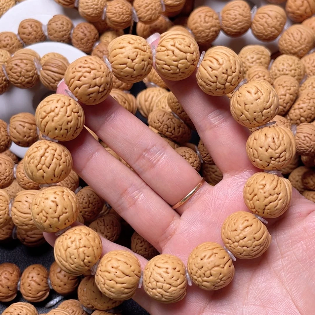 桃核手串时***^肉纹元宝