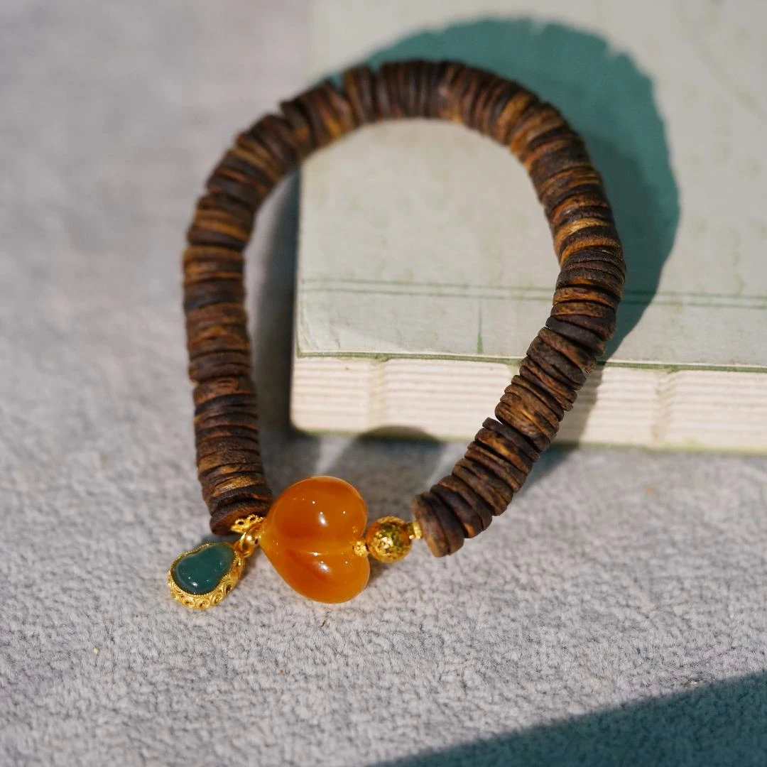 沉香沉香奇楠沉香蜜蜡屁桃片片珠设计款单圈手串YLWC000196