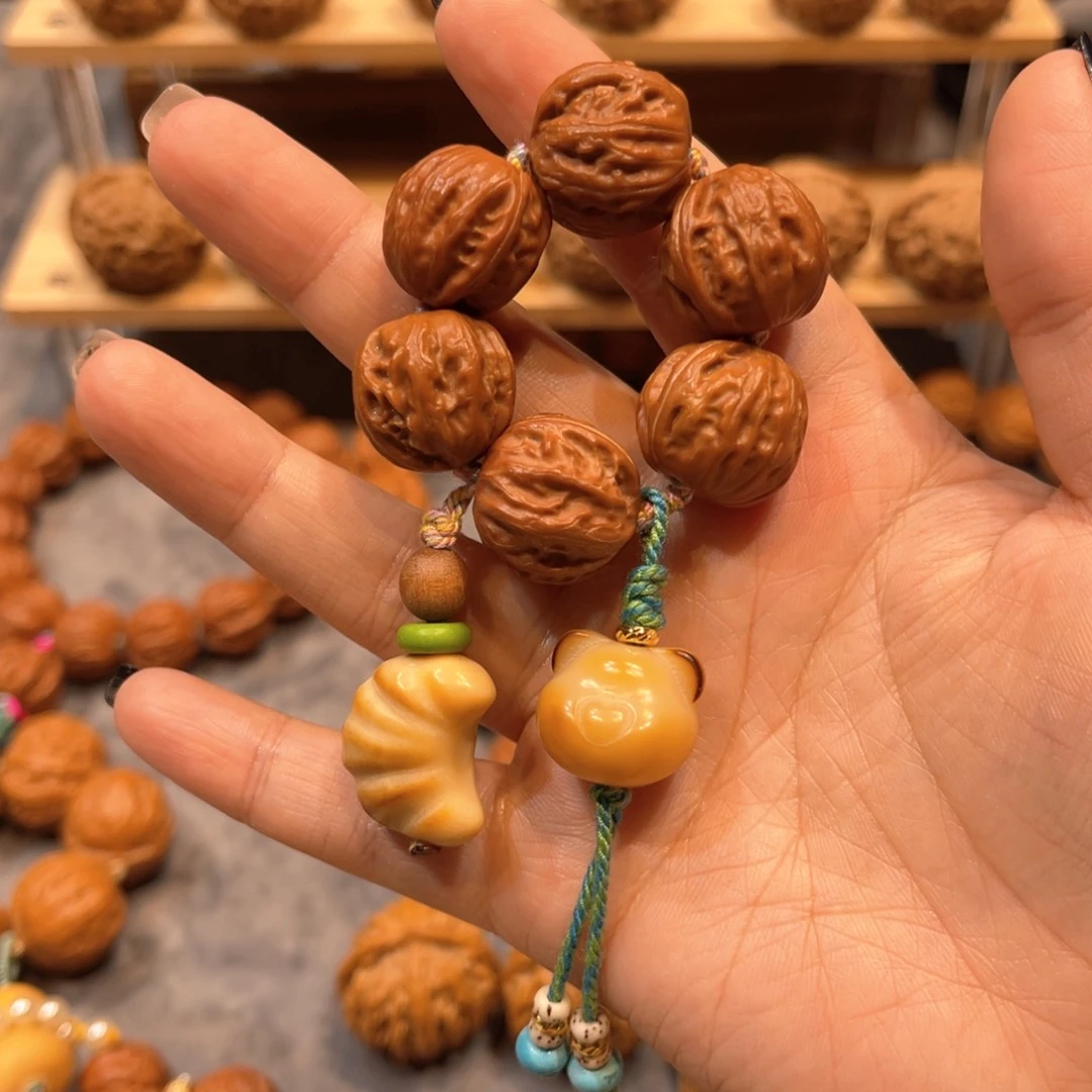 薇***吧文玩核桃把件六星连珠树王牛角款