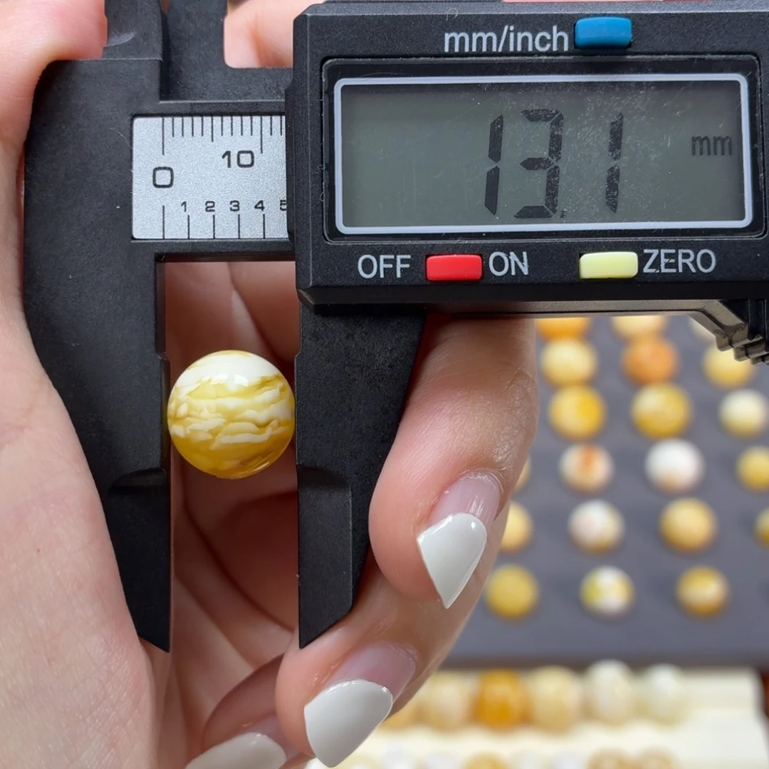 琥珀未镶嵌裸石俄料金白溶洞虎皮纹13.1mm