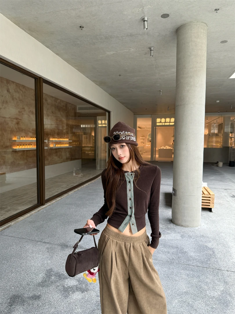 设计感撞色拼接纽扣气质长袖T恤女秋季修身显瘦百搭上衣