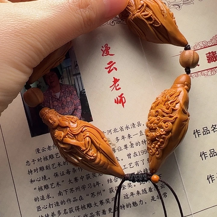 玉***哥手串/手链橄榄核橄榄核