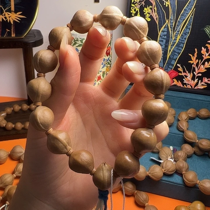 晴***天橄榄核手串蜜桃臀