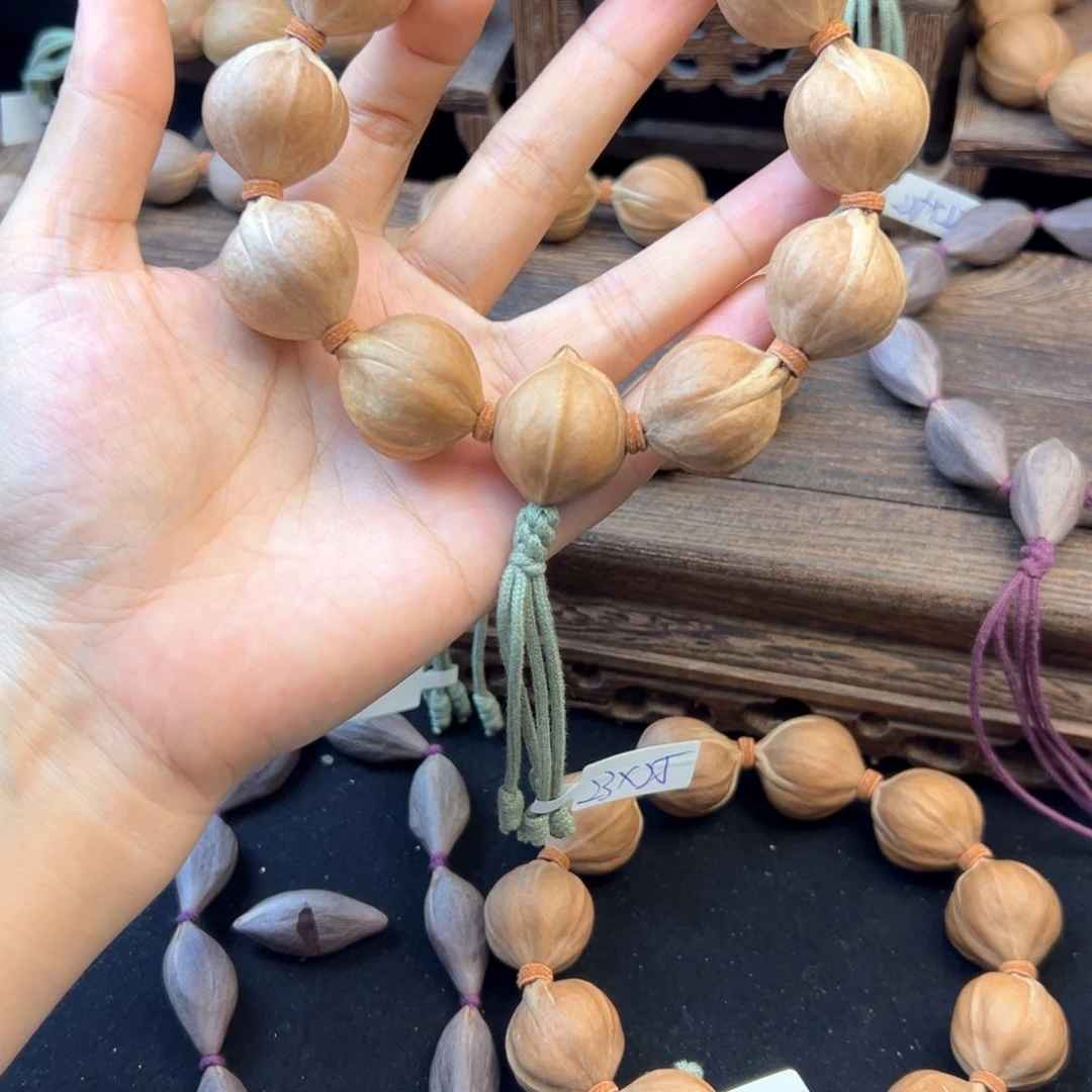 手串橄榄核浮*003。23×25