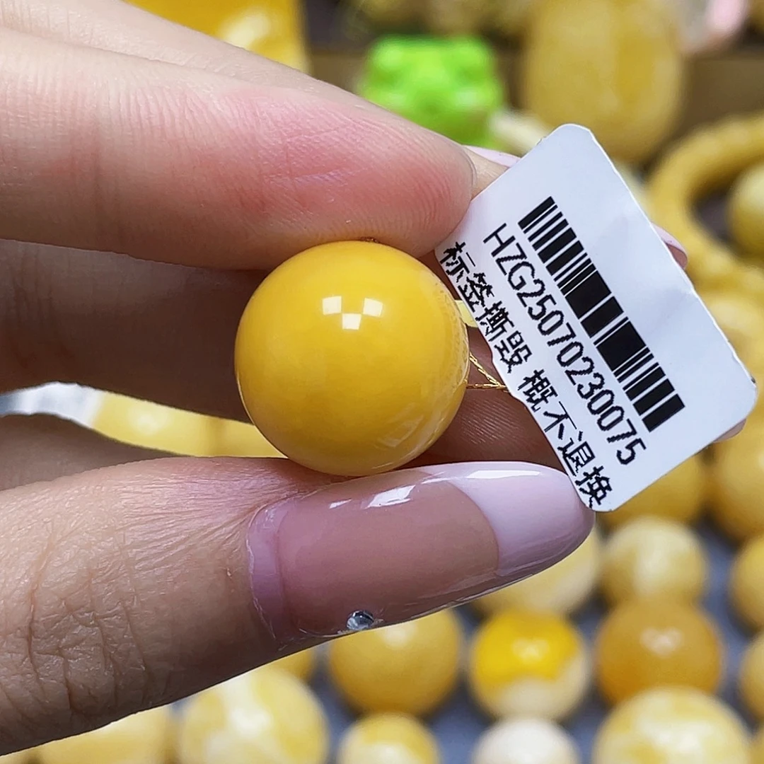 劉***钱蜜蜡未镶嵌裸石16.7mm