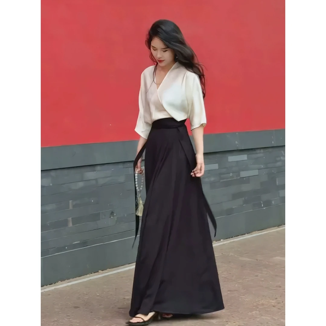 法式气质V领拼接连衣裙女夏季2025新款高级感收腰显瘦中长款裙子