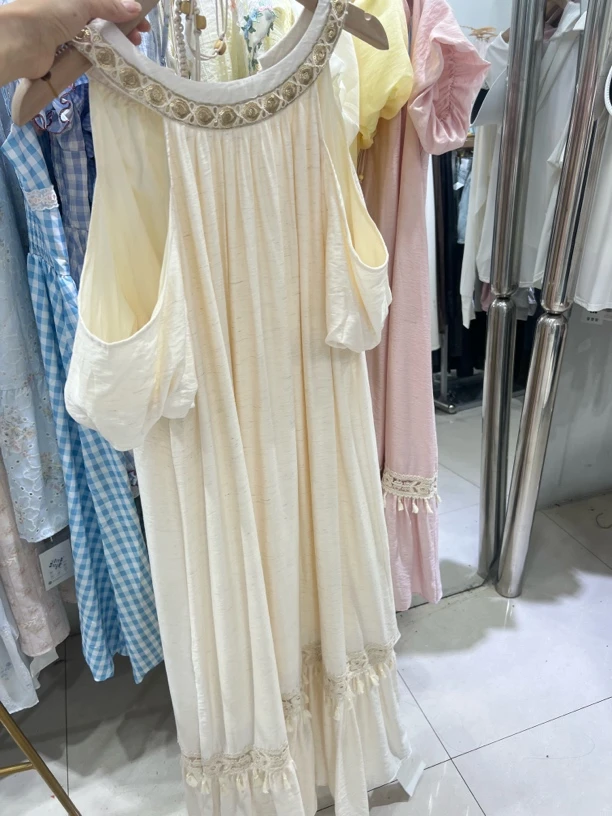 挂脖露肩宽松流苏法式度假风夏季连衣裙