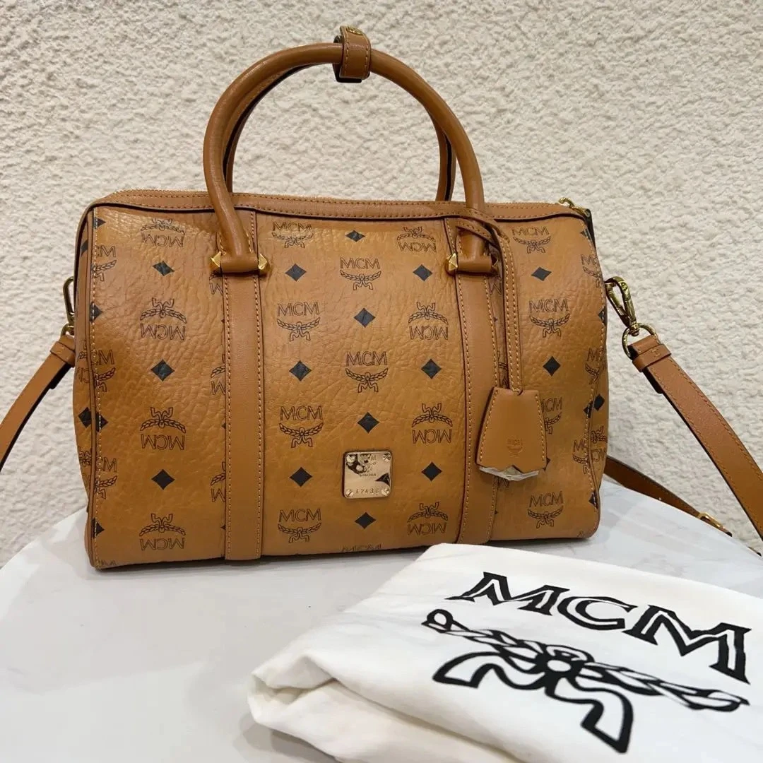 95新 MCM 95新MCM 中号 干邑 波士顿  牛皮 斜挎包
