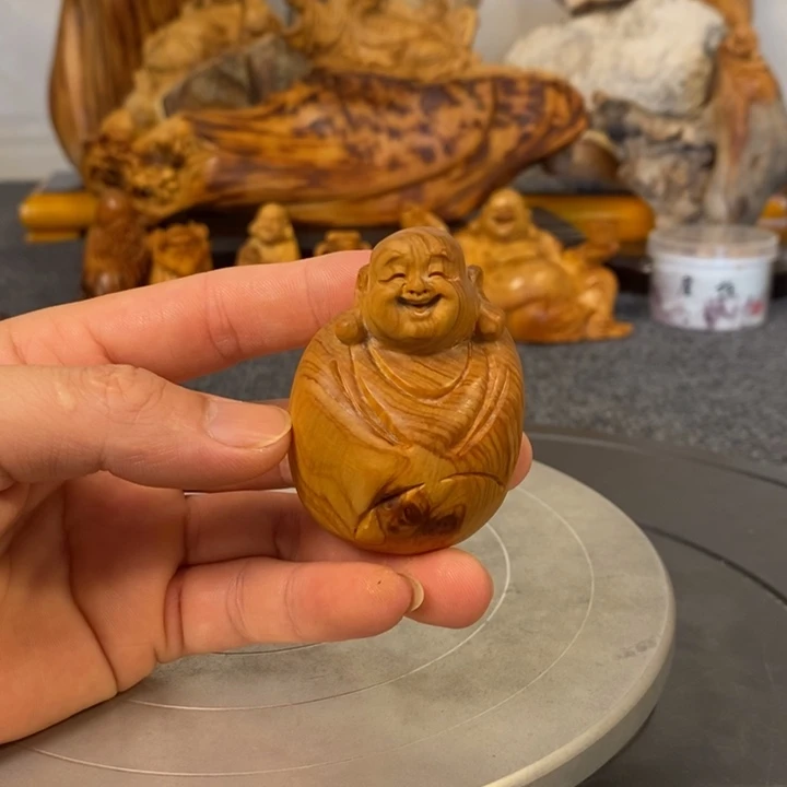 柏木（崖柏）弥勒佛手把件