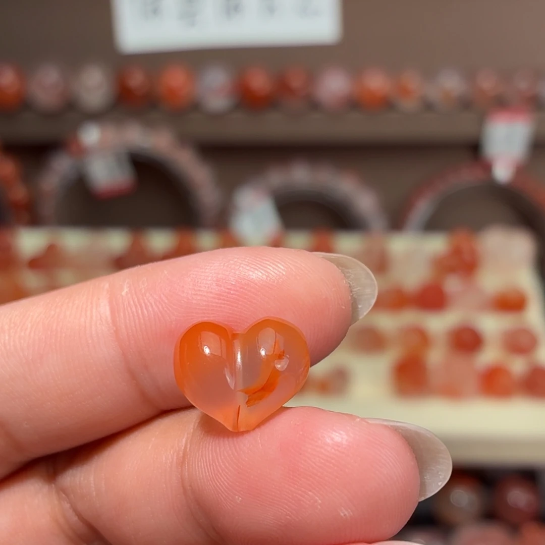 雯***晴南红玛瑙未镶嵌川料通孔屁桃