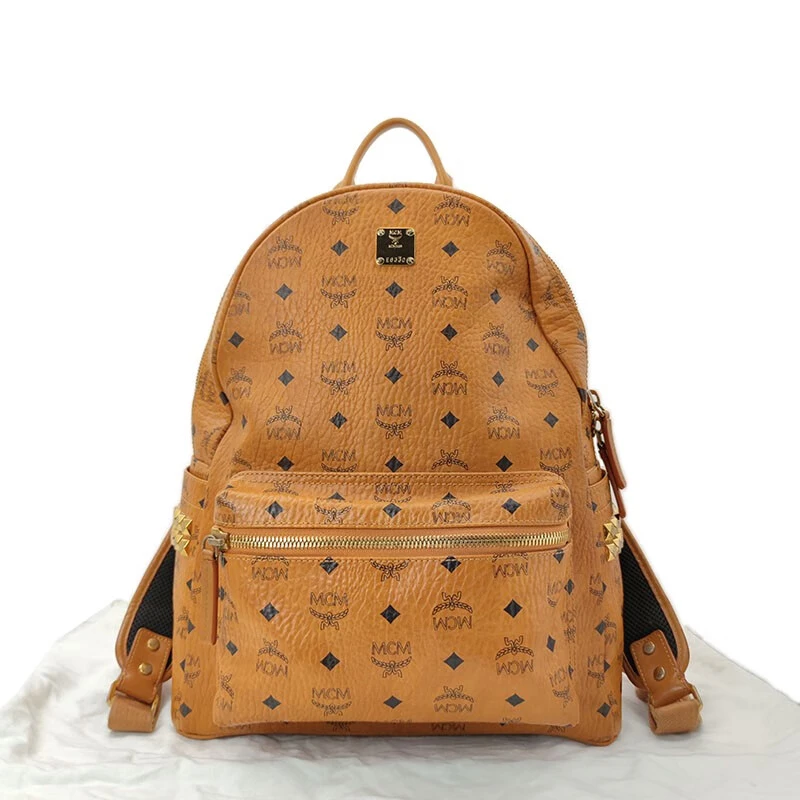 95新 MCM 经典侧面铆钉印花Logo焦糖色大学生时尚双肩包男女中号