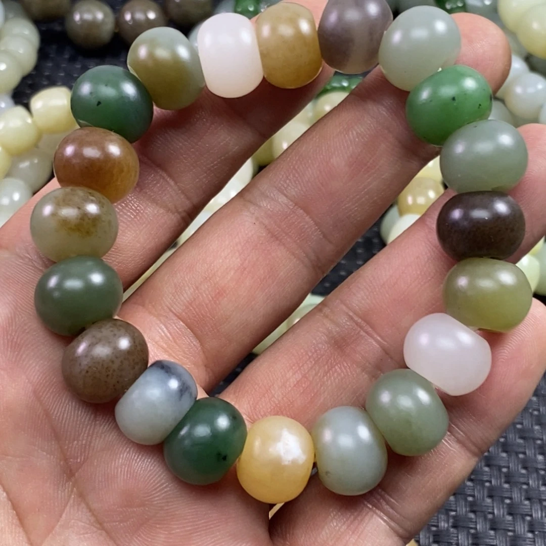 和田玉手把件未镶嵌