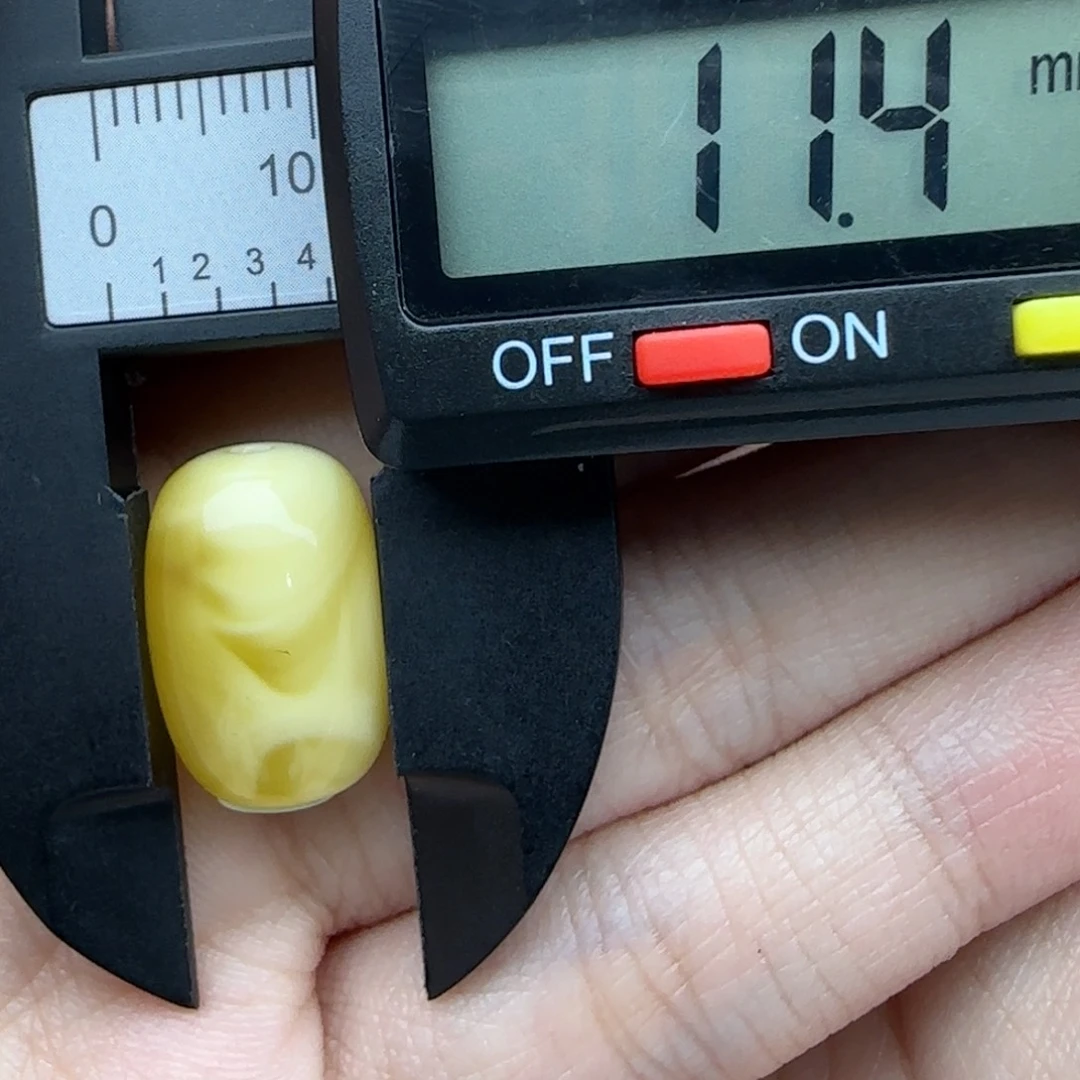 ****生蜜蜡未镶嵌裸石溶洞桶珠