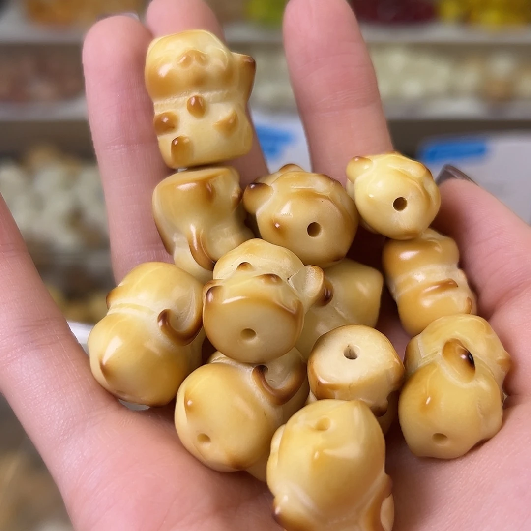 菩提根/象牙果手串瑕疵炭烤招财猫10颗