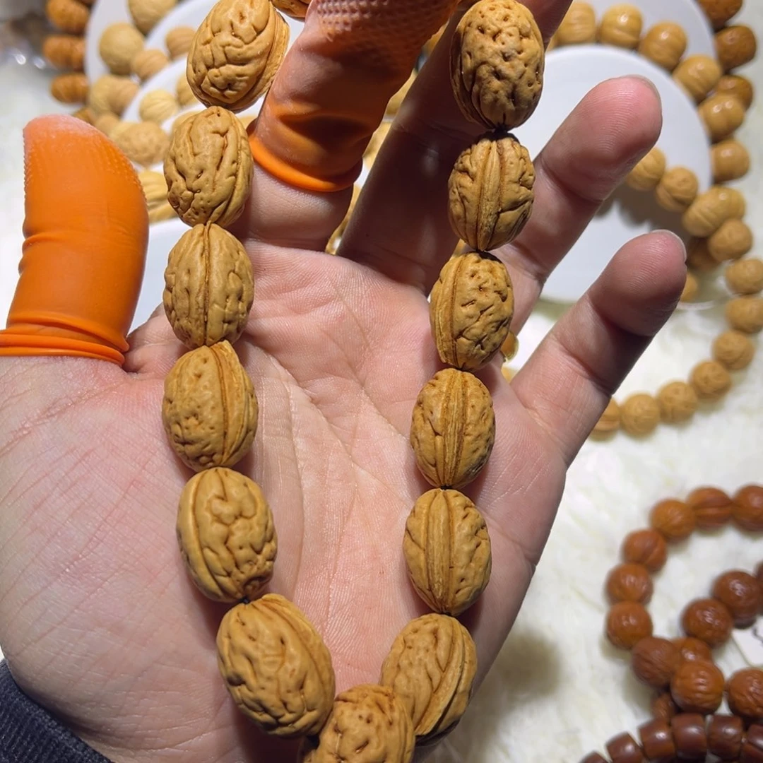 瑞***妍吊坠桃核钱袋子桃核手持