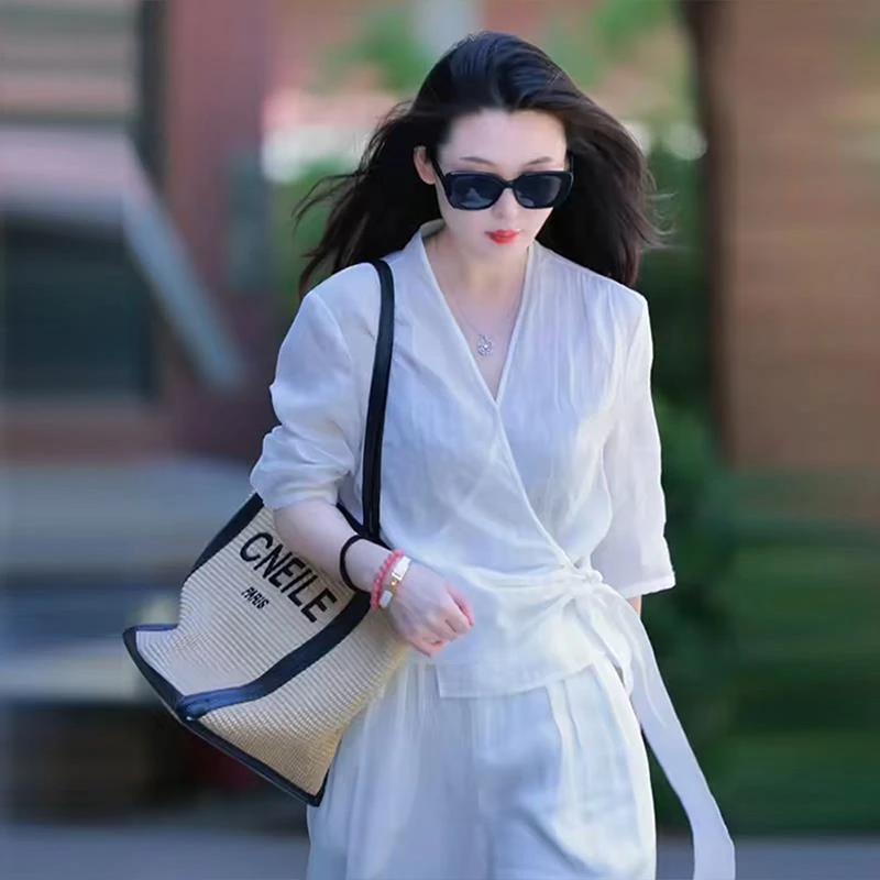 高级苎麻白色衬衫女秋季今年新款高端洋气亚麻衬衣系带七分袖上衣