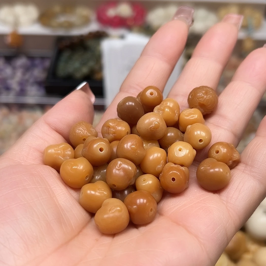 手串菩提根/象牙果卡12风化黄宝宝佛30颗