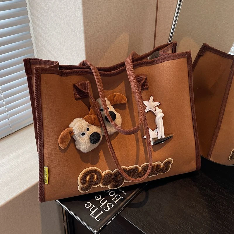 卡通大容量帆布托特包女2025新款潮时尚单肩包休闲手提上课通勤包