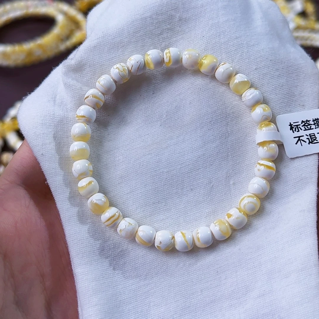 琥珀未镶嵌裸石6.5mm漆白闪电妖花