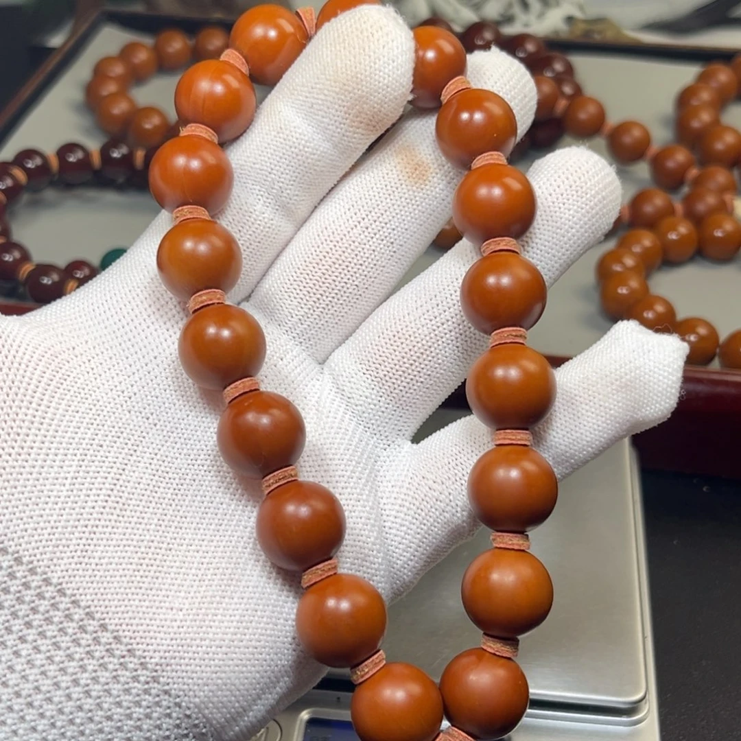 用***6橄榄核吊坠1.5+树王全品手持