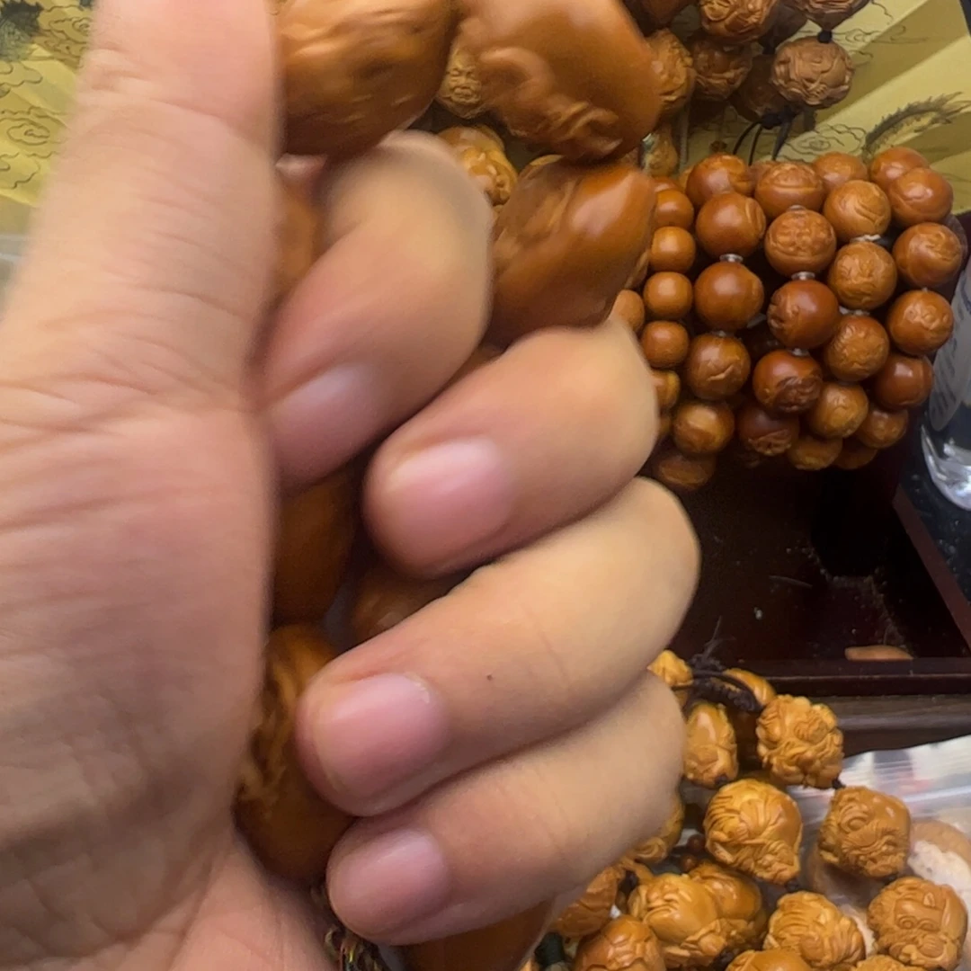 长***生吊坠橄榄核返油生命