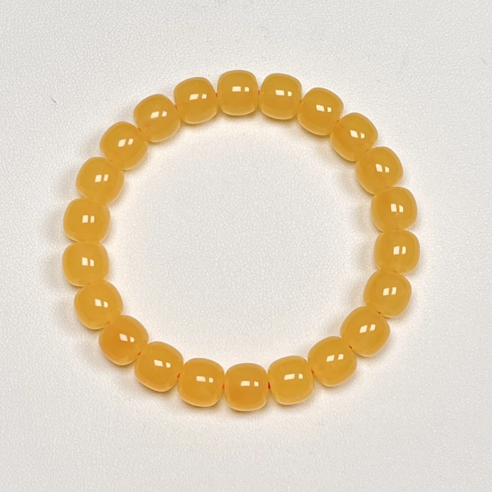 10*9mm焦皮橘红同料蜜蜡手串女款