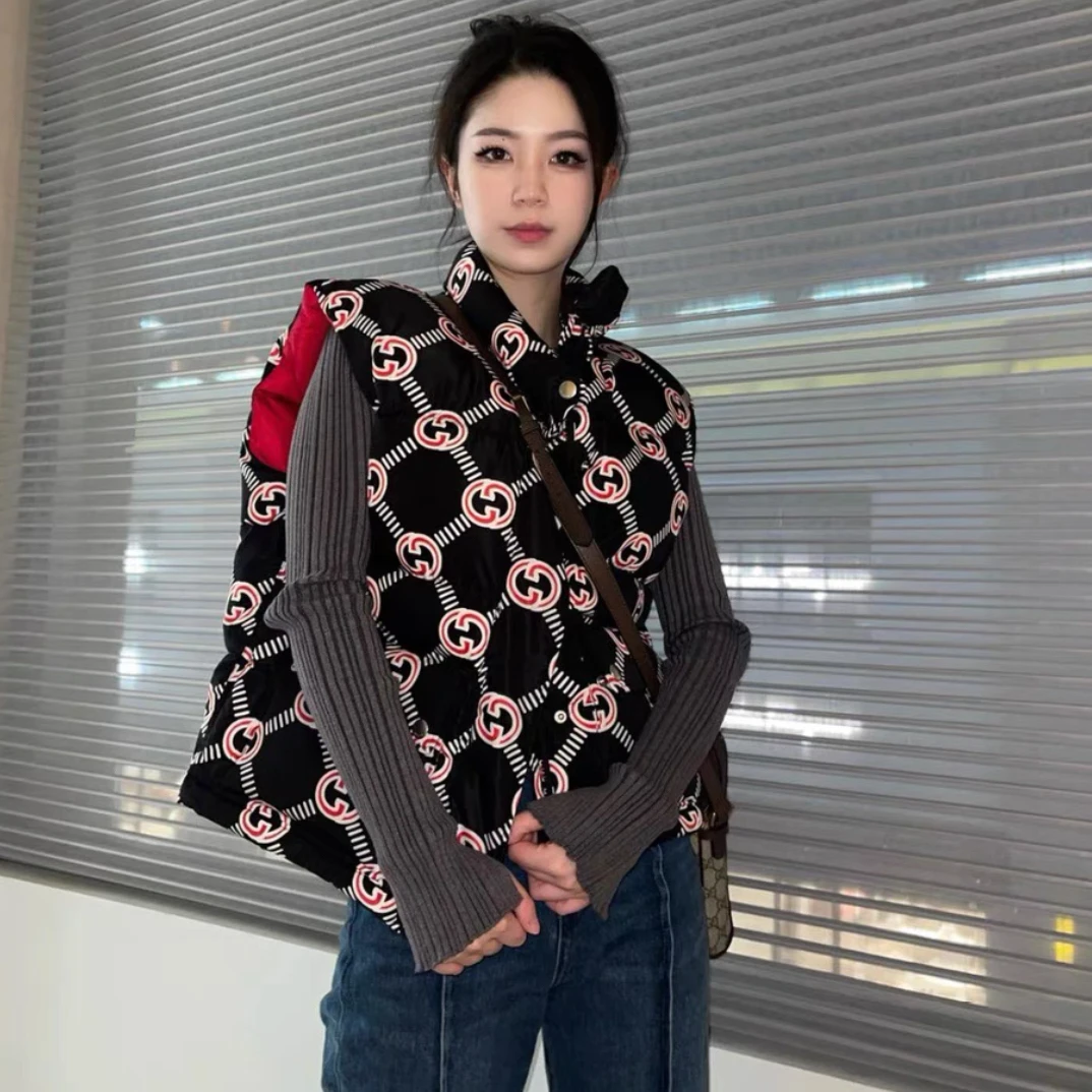 99新 GUCCI/古驰 满logo羽绒马甲/38码/B01574