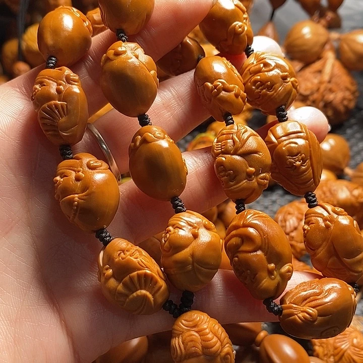 吊坠橄榄核四**達财神手持