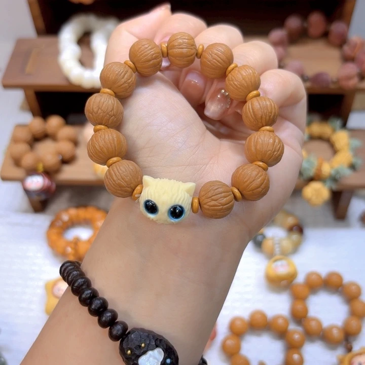 星月菩提手串猴头凤羽手串猫猫头