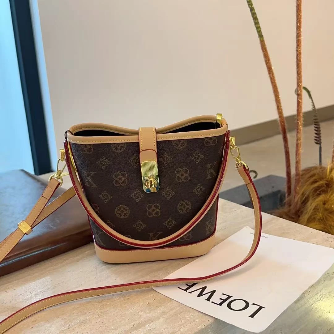 优库迪斯UK夏季新款时尚百搭单肩斜挎多层水桶包