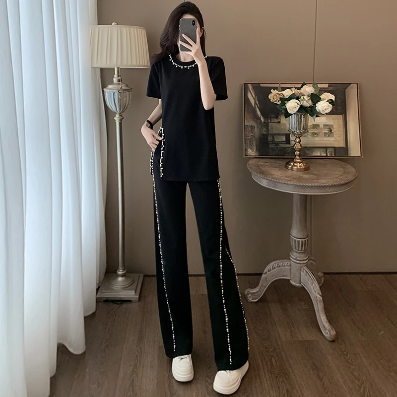 轻奢高级感休闲运动套装女夏季新款开叉黑色短袖上衣阔腿裤两件套