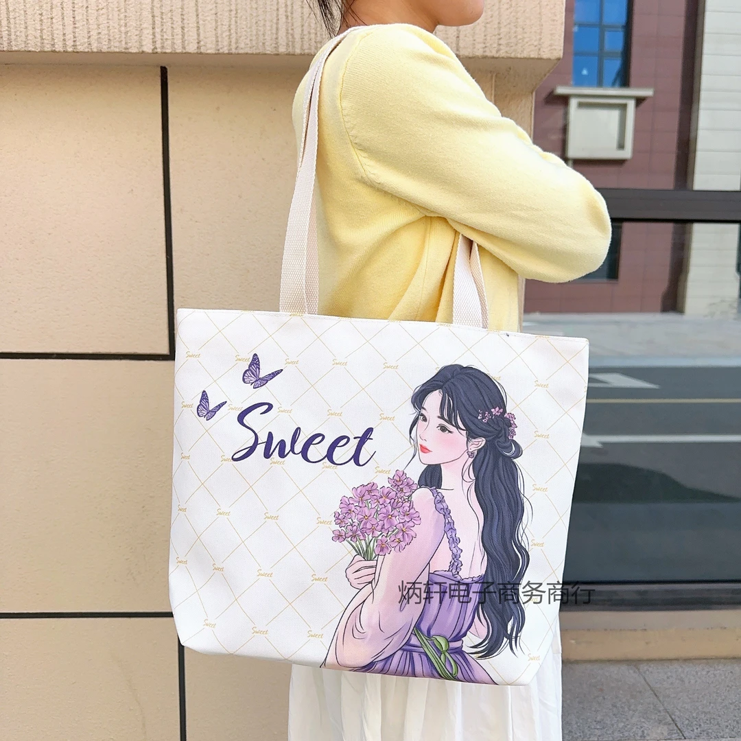 2025时尚帆布包新款大容量单肩包双面印花百搭通勤包女休闲妈咪包