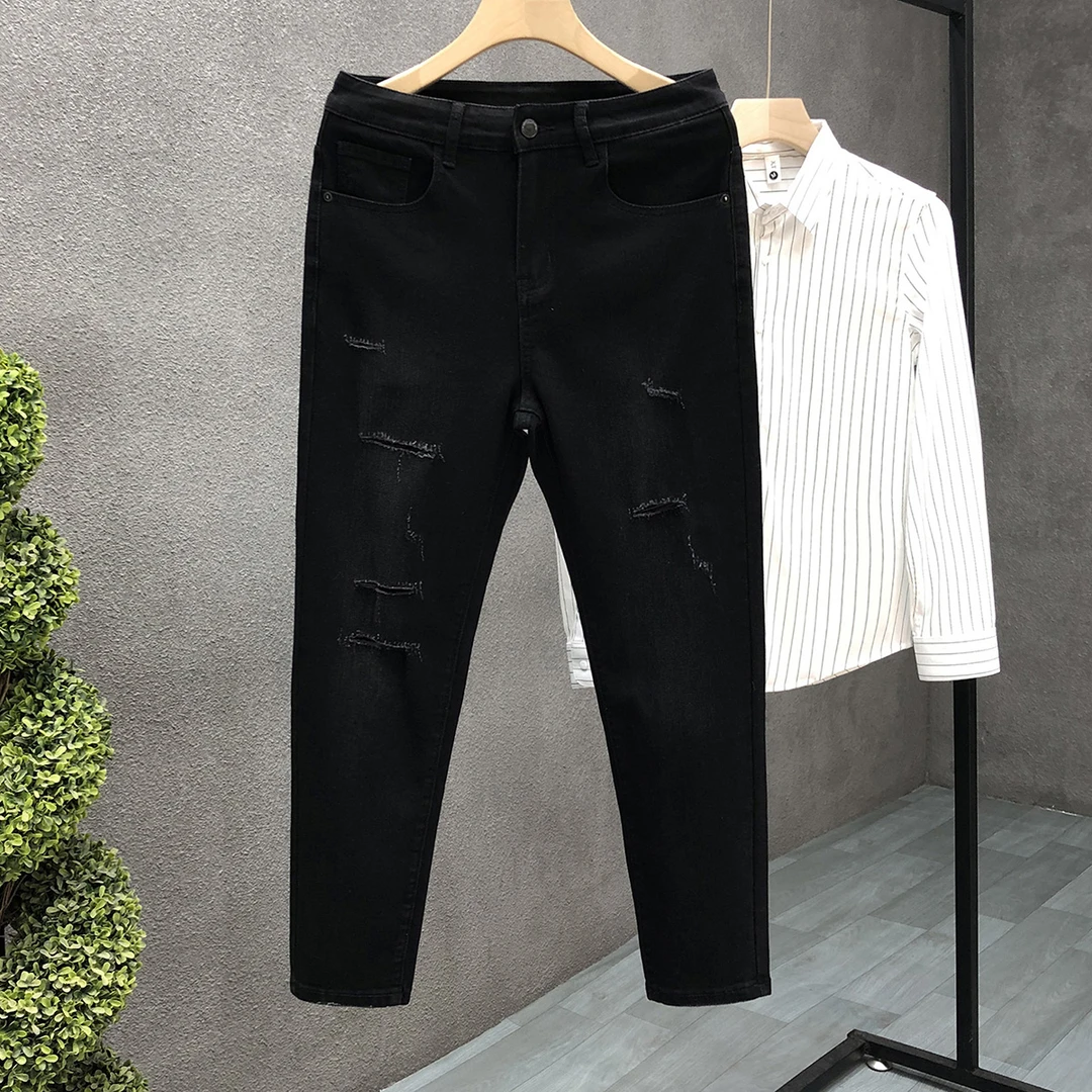 潮牌黑色百搭牛仔裤男士2025夏季新款修身小脚裤高级感破洞九分裤