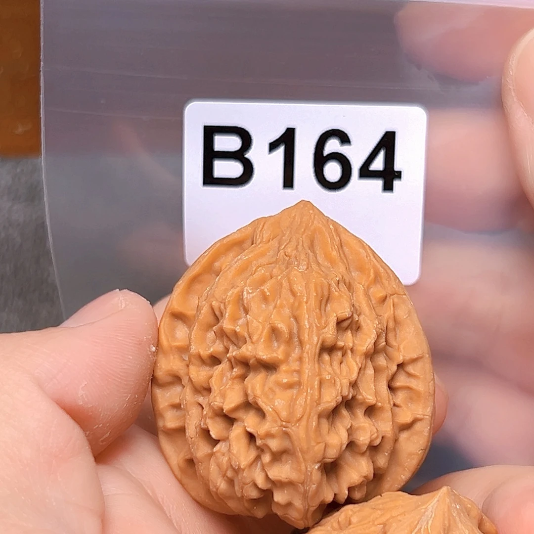 文玩核桃吊坠鸡心