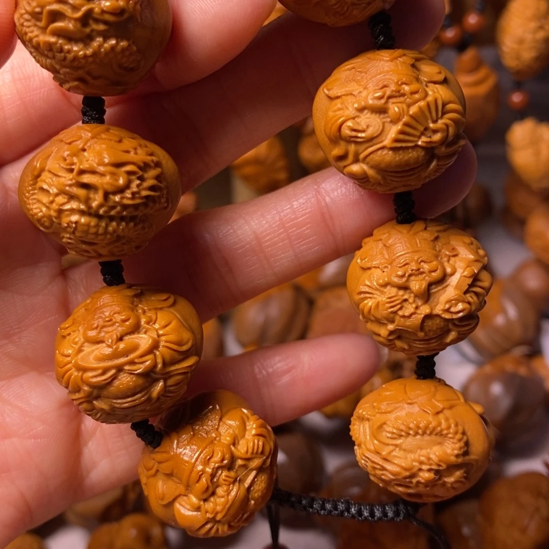 张***栋橄榄核手串/手链九龙财神
