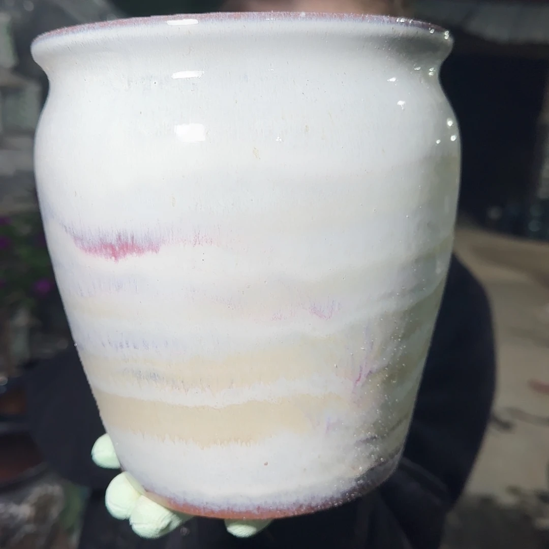 花盆紫砂高20口17。