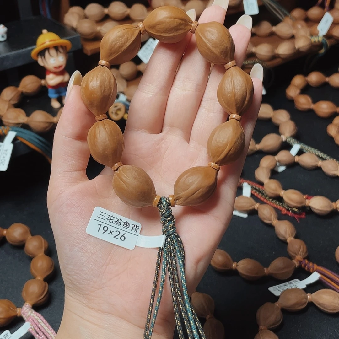 欢***手串/手链橄榄核1926三花鲨鱼背