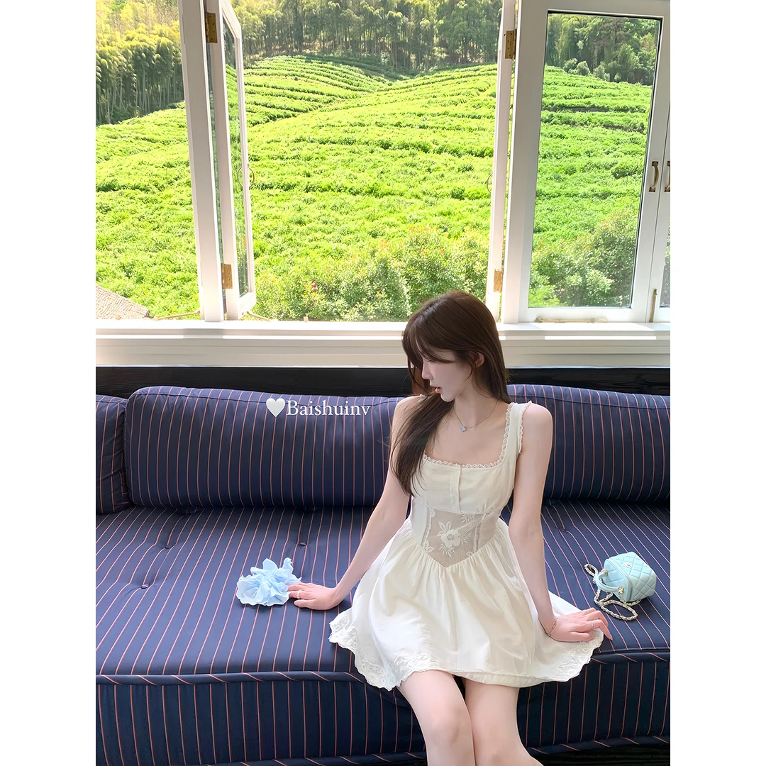 白水女初恋小白花绣花蕾丝吊带连衣裙女夏小白裙 B50551090