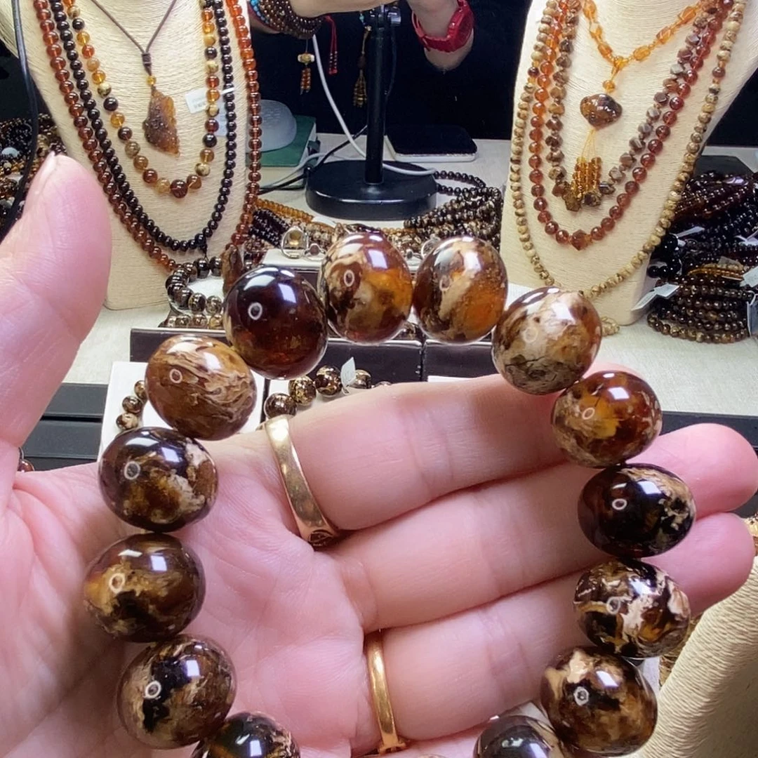 勇***士琥珀未镶嵌裸石溶洞蜡花16m