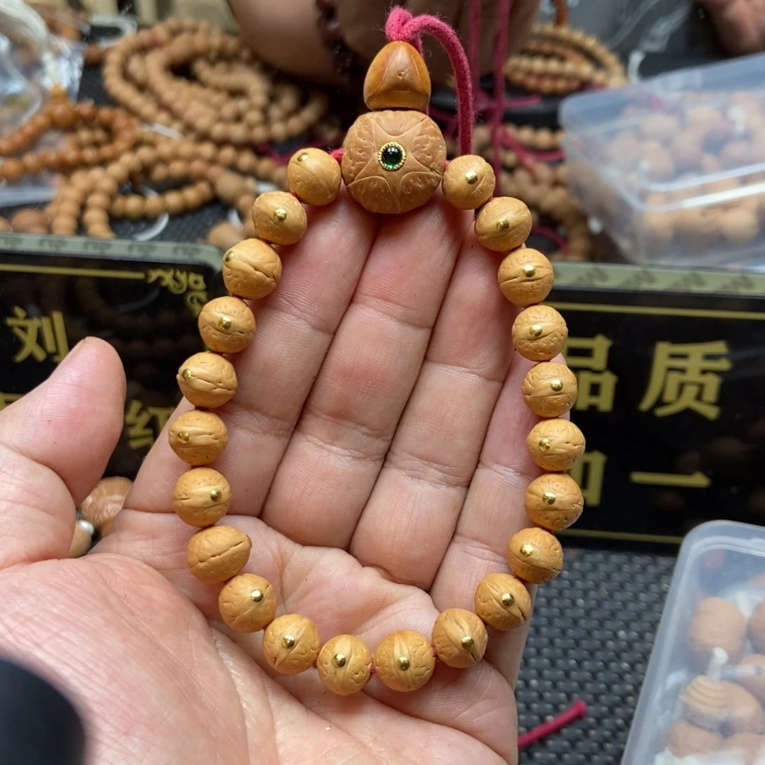 凤眼菩提吊坠9.5+实心金钉手串