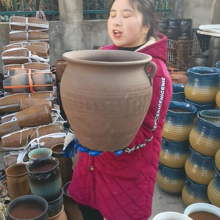 红陶口28高30瑕疵底部烧裂掉耳朵