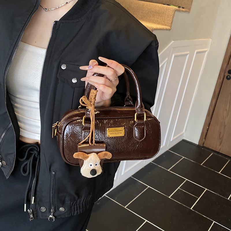 2025秋冬新款单肩斜挎手提包包女大容量复古通勤波士顿棒球枕头包