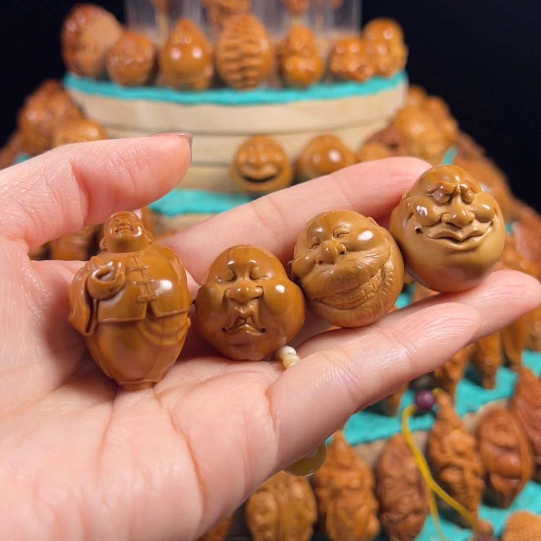 勇***仔橄榄核手串/手链地主~三颗怪脸