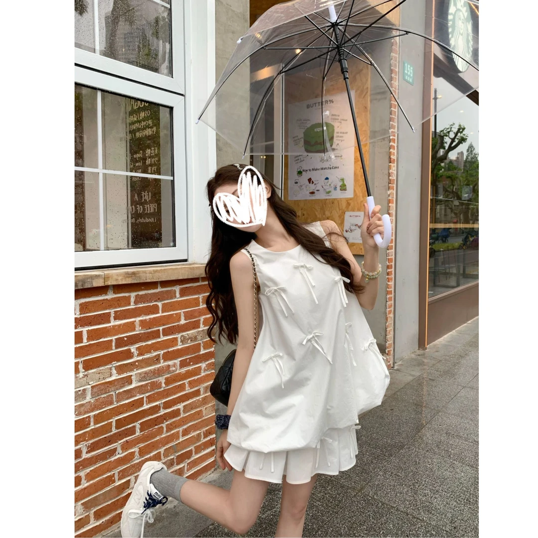 立体蝴蝶结花苞背心上衣白色百褶短裙