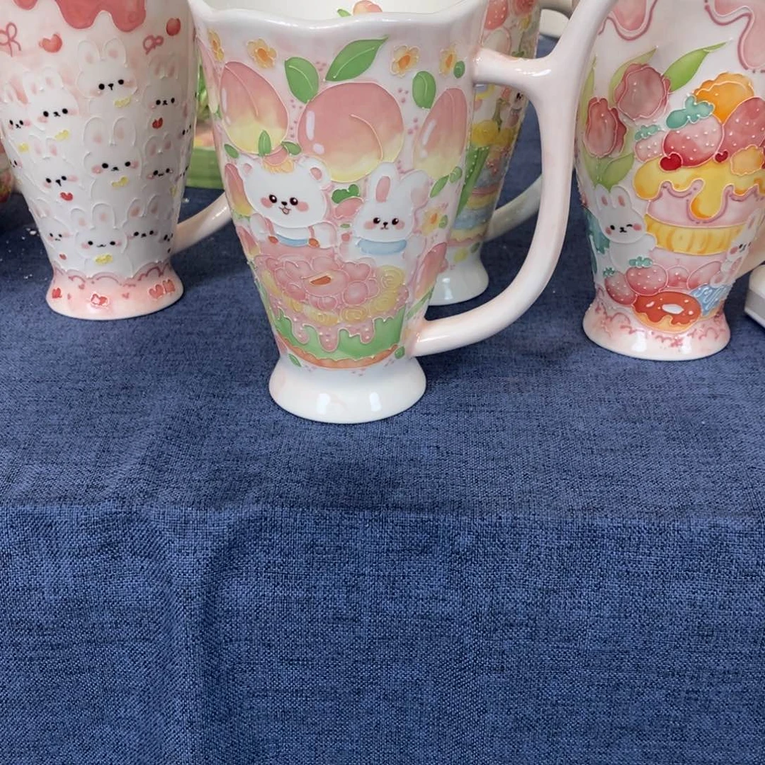 *****瓷片桃子熊猫马克杯