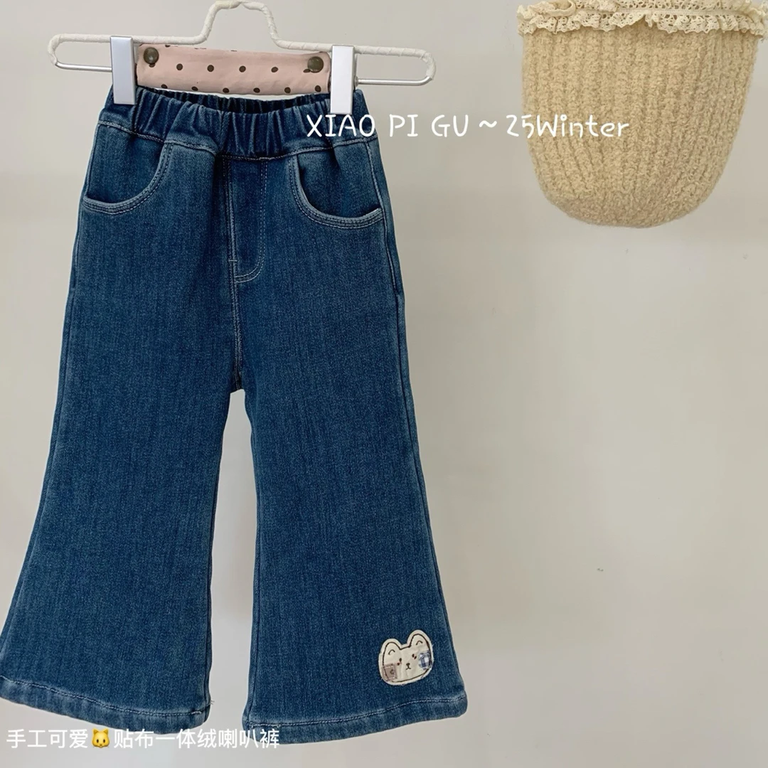 小屁股微喇贴布一体绒牛仔裤