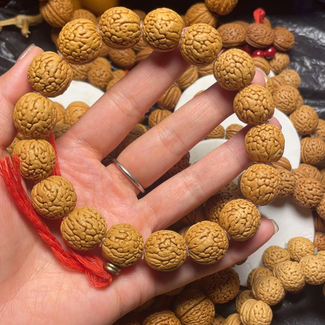 胡***3桃木桃核手串18+铁扇